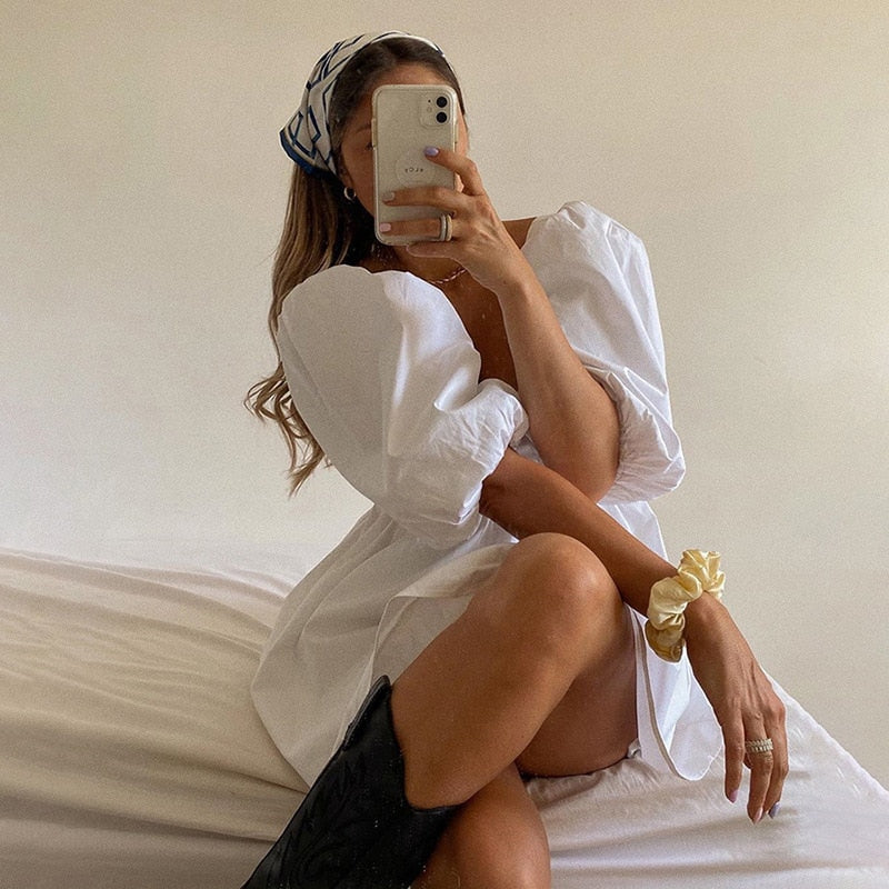 TALULA Mini Dress Features Backless Lace-Up Closures and Puffed Sleeves for a Modern Look White / L