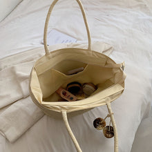 Load image into Gallery viewer, IOKE #2 Large women's straw beach tote with PomPom charms