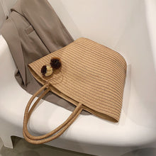 Load image into Gallery viewer, IOKE #2 Large women's straw beach tote with PomPom charms