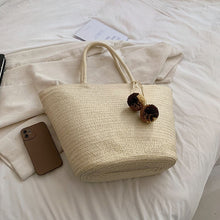 Load image into Gallery viewer, IOKE #2 Large women's straw beach tote with PomPom charms