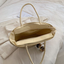 Load image into Gallery viewer, IOKE #2 Large women's straw beach tote with PomPom charms