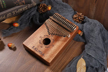 Laden Sie das Bild in den Galerie-Viewer, PUK #1 17 Keys Bull Kalimba Thumb Piano Mahogany Body Musical Instrument - Bali Lumbung