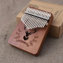Laden Sie das Bild in den Galerie-Viewer, PUK #1 17 Keys Bull Kalimba Thumb Piano Mahogany Body Musical Instrument - Bali Lumbung