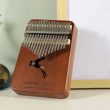 Laden Sie das Bild in den Galerie-Viewer, PUK #1 17 Keys Bull Kalimba Thumb Piano Mahogany Body Musical Instrument - Bali Lumbung