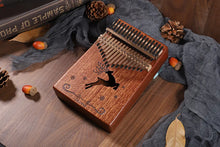 Laden Sie das Bild in den Galerie-Viewer, PUK #1 17 Keys Bull Kalimba Thumb Piano Mahogany Body Musical Instrument - Bali Lumbung