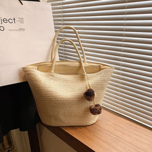 Load image into Gallery viewer, IOKE #2 Large women&#39;s straw beach tote with PomPom charms