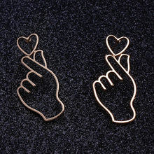 Cargar imagen en el visor de la galería, OBI Hand Holding Heart Shape Valentine&#39;s Gift Unique Stud Earrings - Bali Lumbung