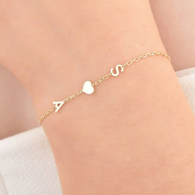 WOMAN'S GOLDEN STEEL BRACELET WITH HEART, BUTTERFLY AND